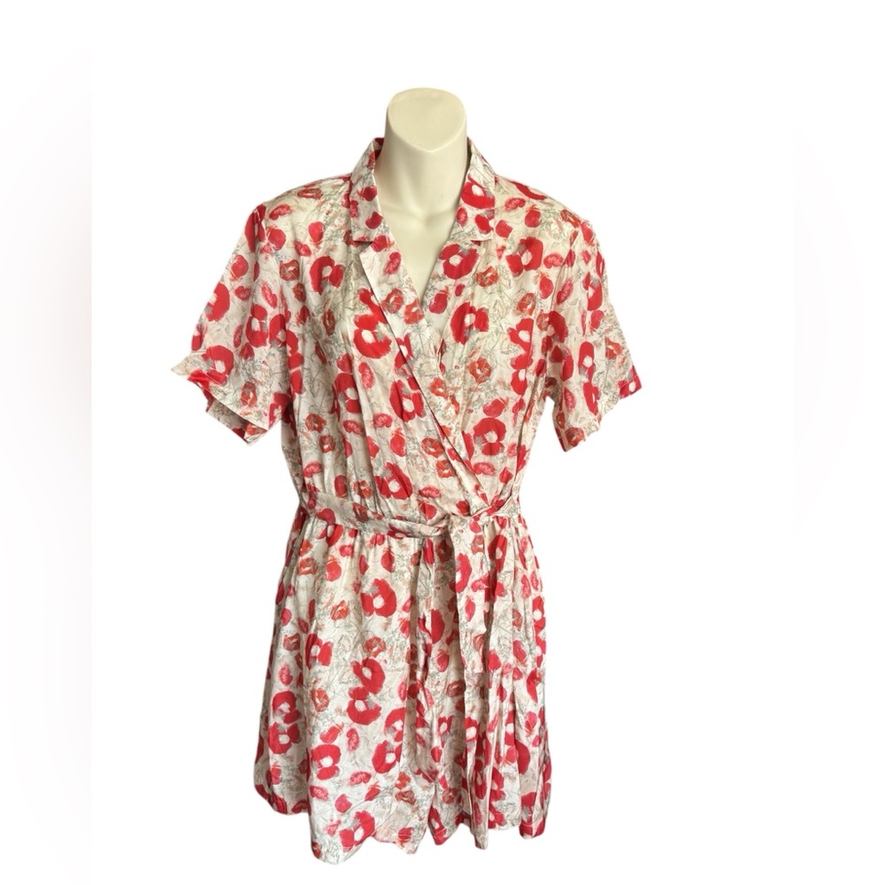 The Korner Floral Wrap romper with Red and White Pattern. NWT